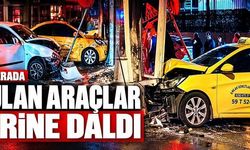 Kazada savrulan araçlar iş yerine çarptı