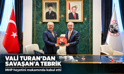 Vali Turan yeniden seçilen MHP İl Başkanı Savaşan'ı kabul etti